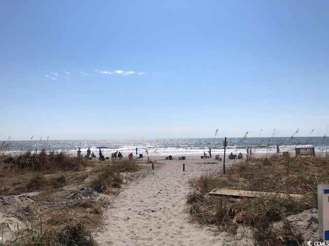 property view of water featuring a view of the beach