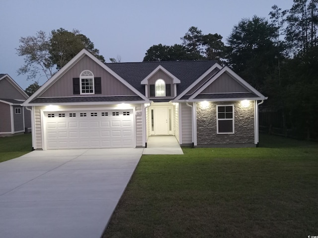 craftsman-style home featuring a yard