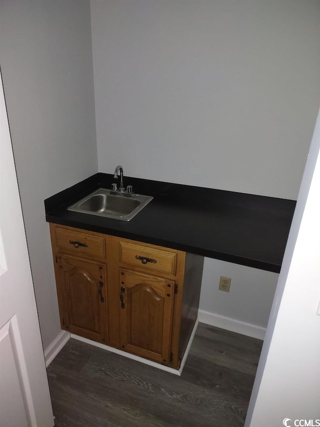 bathroom featuring vanity and wood-type flooring