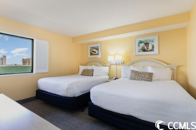 bedroom featuring dark hardwood / wood-style flooring