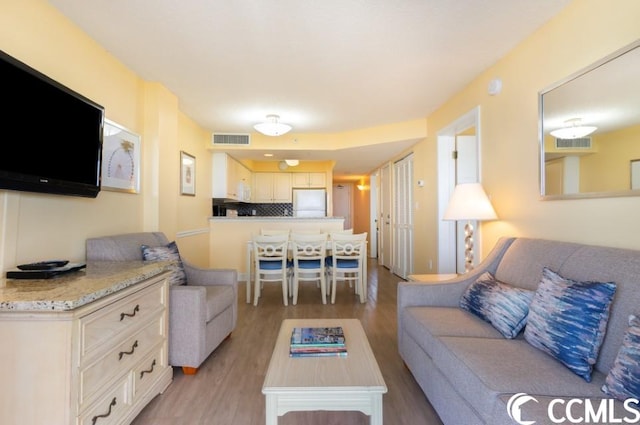 living room with light wood-type flooring