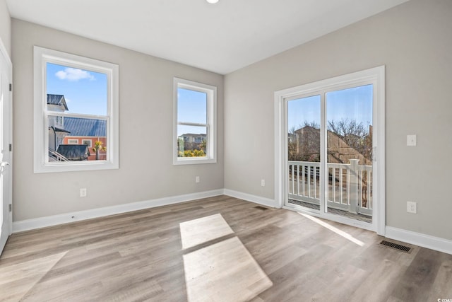 empty room featuring light hardwood / wood-style floors