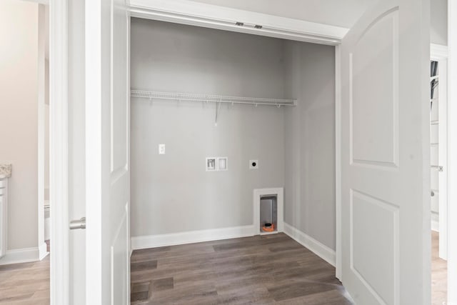 washroom featuring hookup for an electric dryer, hookup for a washing machine, and hardwood / wood-style floors