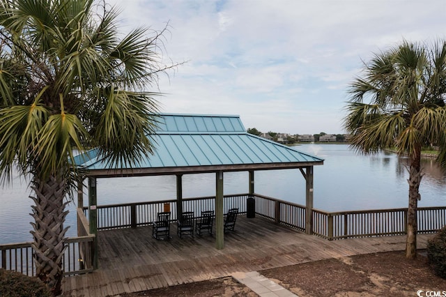 dock area with a water view and a gazebo