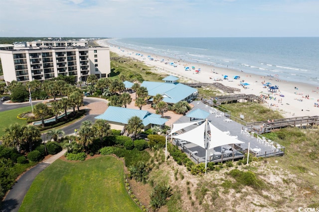 aerial view featuring a water view and a beach view