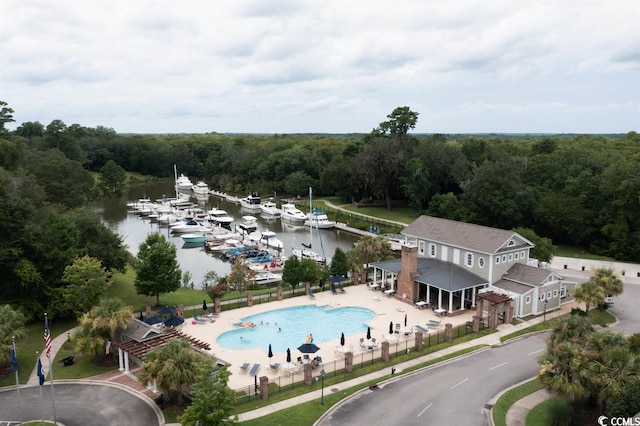 birds eye view of property featuring a water view