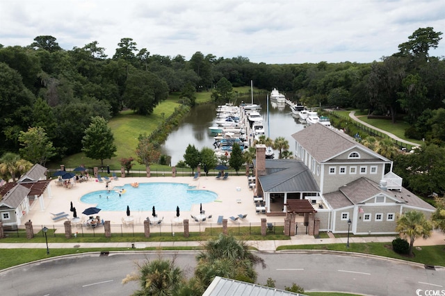 birds eye view of property featuring a water view