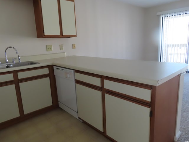 510 Fairwood Lakes Dr Unit 16M, Myrtle Beach, SC 29588 - kitchen with sink, dishwasher, white cabinets, and kitchen peninsula