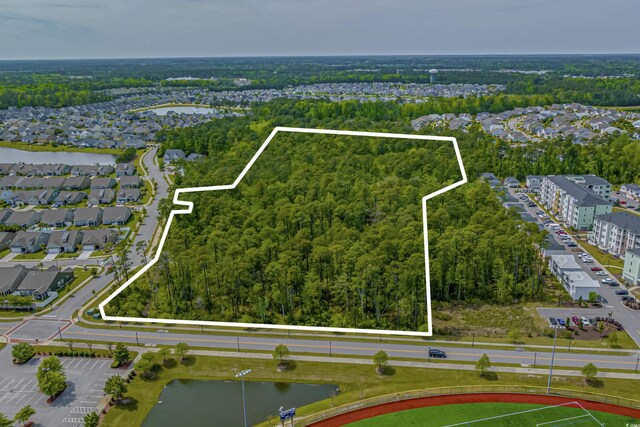 821 Maxine Ct Unit 2C, Myrtle Beach, SC 29577 - birds eye view of property with a water view, a view of trees, and a residential view