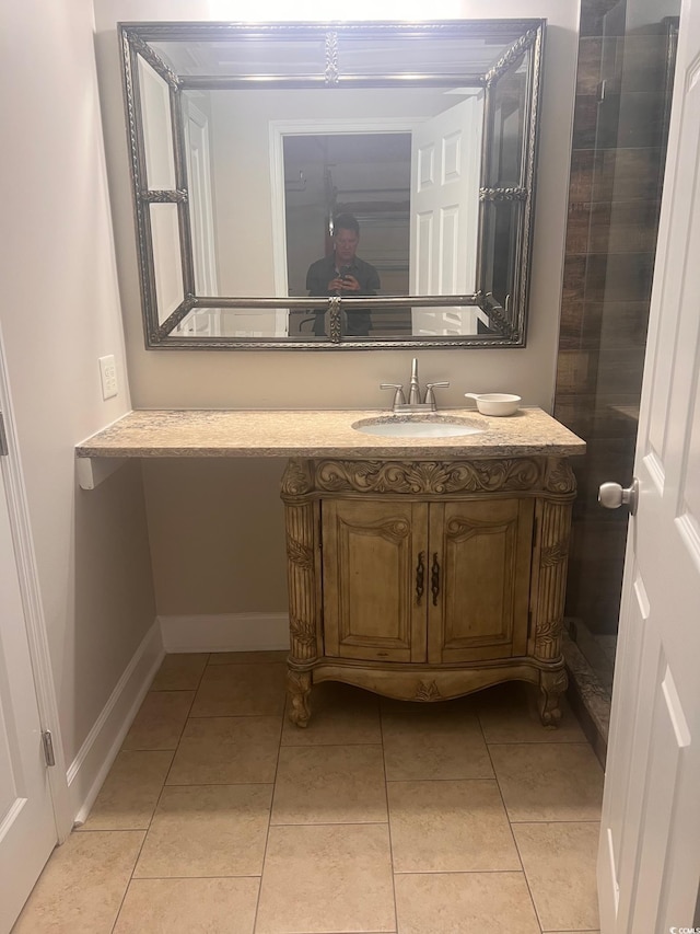 bathroom with vanity and tile patterned floors