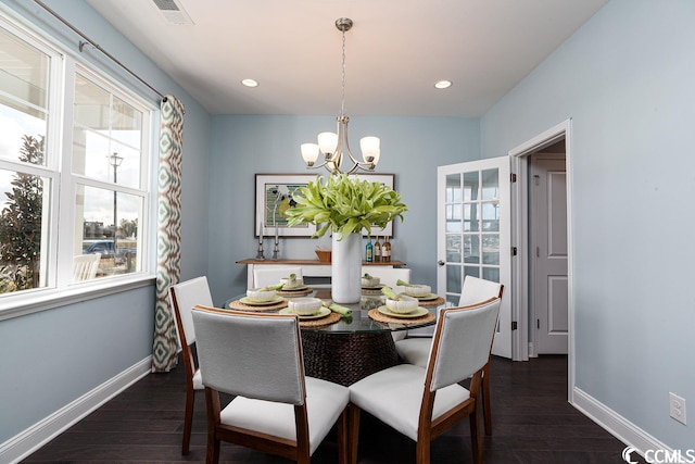 dining area with baseboards, visible vents, dark wood-style flooring, and recessed lighting