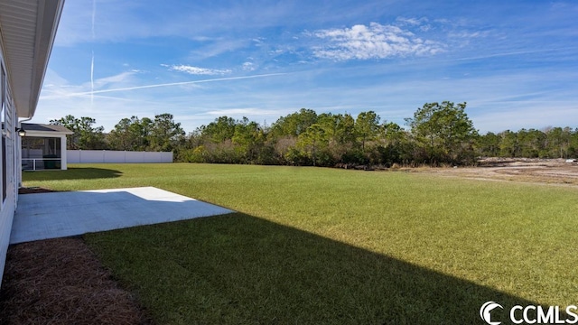 view of yard with a patio area and fence