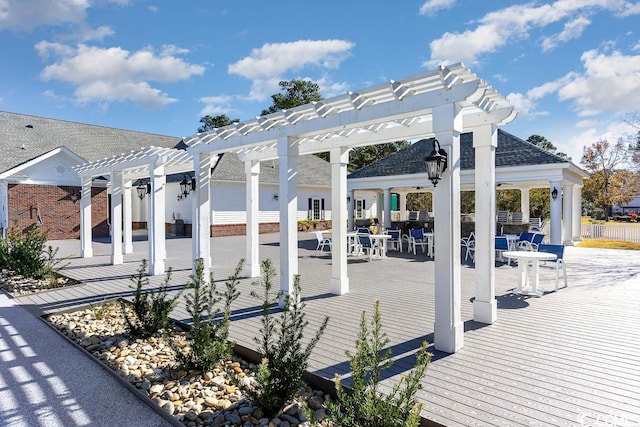 view of home's community featuring a patio and a pergola