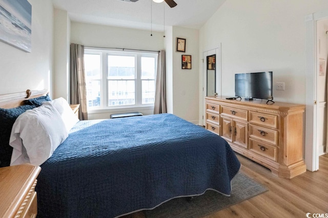 4856 Carnation Cir Unit 304, Myrtle Beach, SC 29577 - bedroom featuring ceiling fan, lofted ceiling, and light wood-type flooring