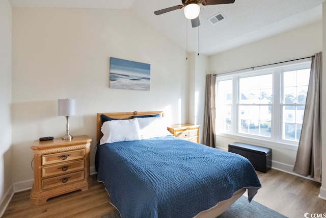 4856 Carnation Cir Unit 304, Myrtle Beach, SC 29577 - bedroom with ceiling fan, vaulted ceiling, and light hardwood / wood-style flooring