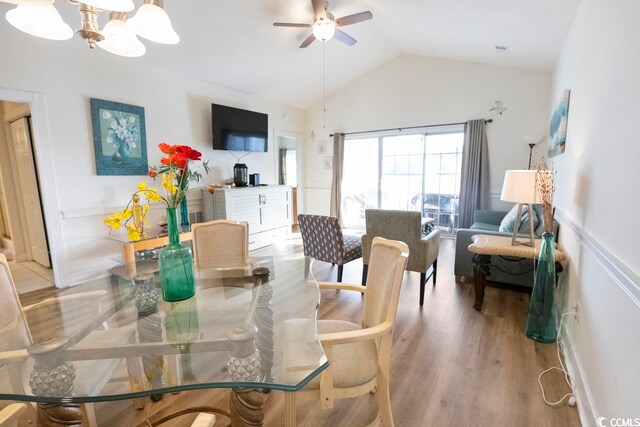 4856 Carnation Cir Unit 304, Myrtle Beach, SC 29577 - dining space with lofted ceiling, light hardwood / wood-style floors, and ceiling fan with notable chandelier