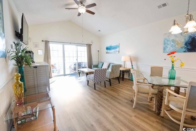 4856 Carnation Cir Unit 304, Myrtle Beach, SC 29577 - dining space featuring lofted ceiling, light hardwood / wood-style floors, and ceiling fan with notable chandelier