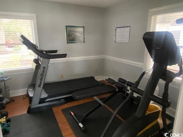 workout room featuring plenty of natural light