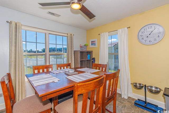 dining area featuring ceiling fan