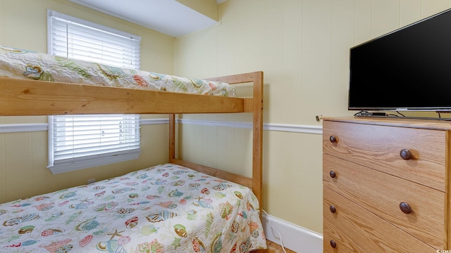 bedroom featuring multiple windows