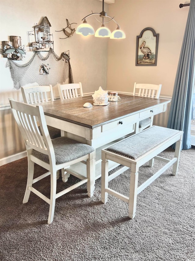 dining room with carpet floors