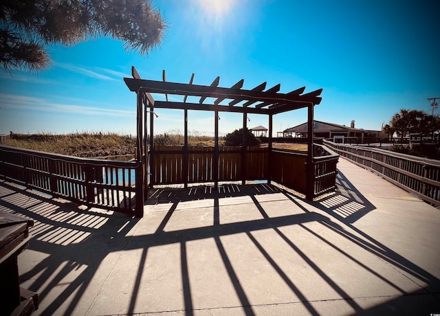 wooden terrace featuring a pergola