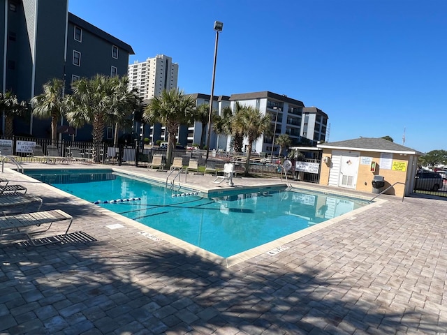 view of pool featuring a patio