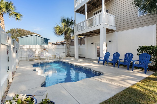 view of swimming pool featuring a patio area