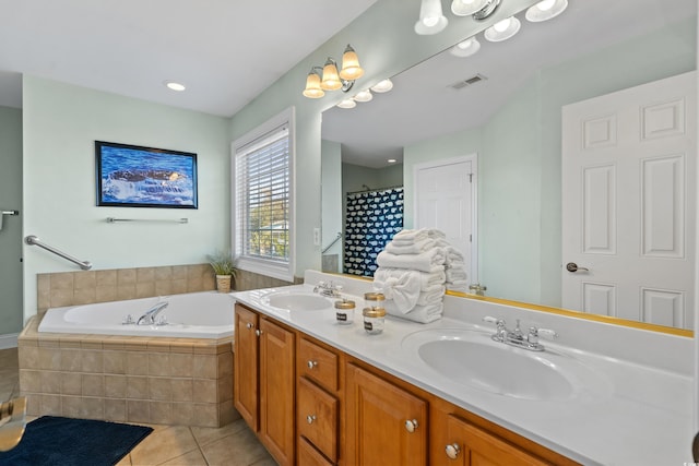 bathroom with vanity, tile patterned floors, and separate shower and tub