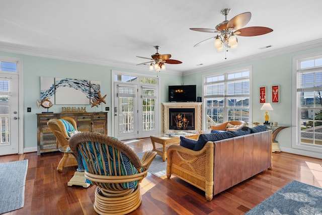 1010 Perrin Dr, North Myrtle Beach, SC 29582 - living room featuring plenty of natural light, a ceiling fan, and crown molding