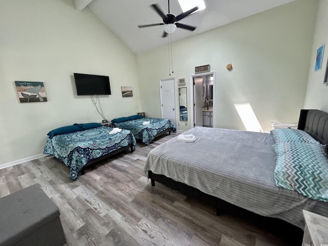 bedroom featuring ensuite bath, ceiling fan, wood-type flooring, high vaulted ceiling, and beamed ceiling