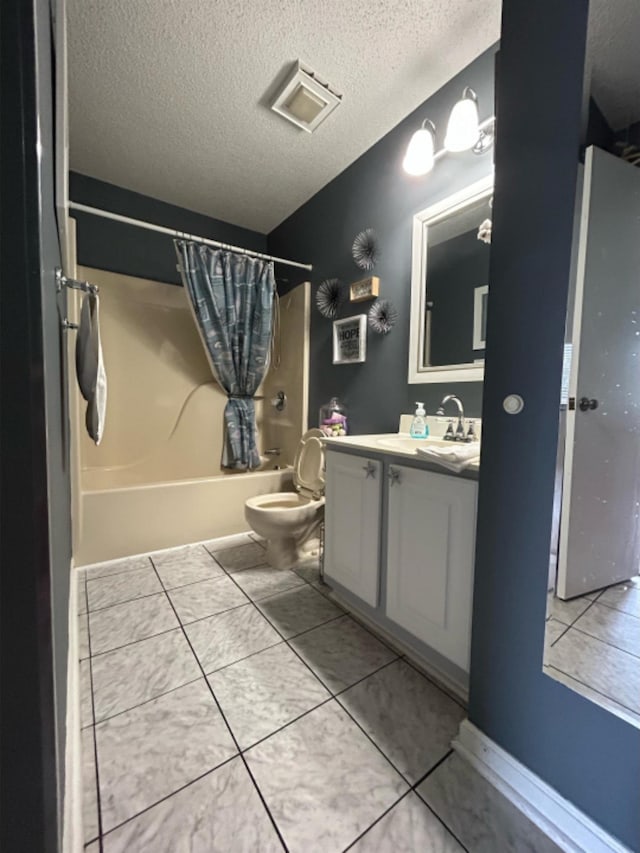 full bathroom with shower / bath combo, tile patterned flooring, a textured ceiling, toilet, and vanity