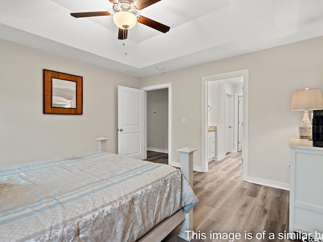 bedroom featuring light hardwood / wood-style flooring and ceiling fan