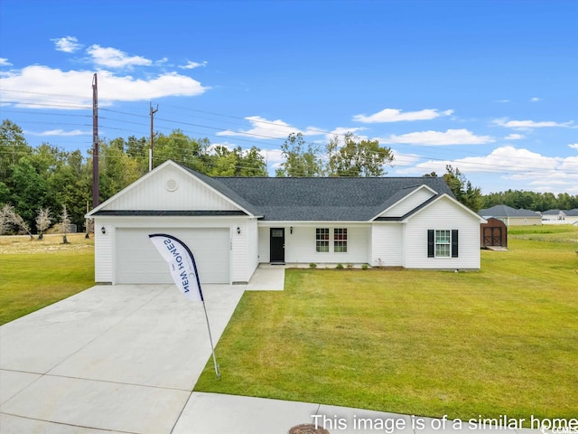 ranch-style house with a front yard and a garage