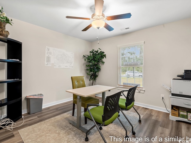 office space with wood-type flooring and ceiling fan