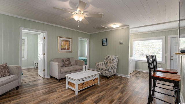 living room with dark wood-style flooring, wood ceiling, and baseboards