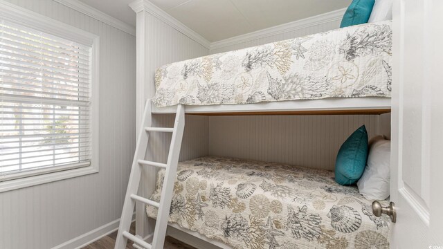 bedroom with crown molding