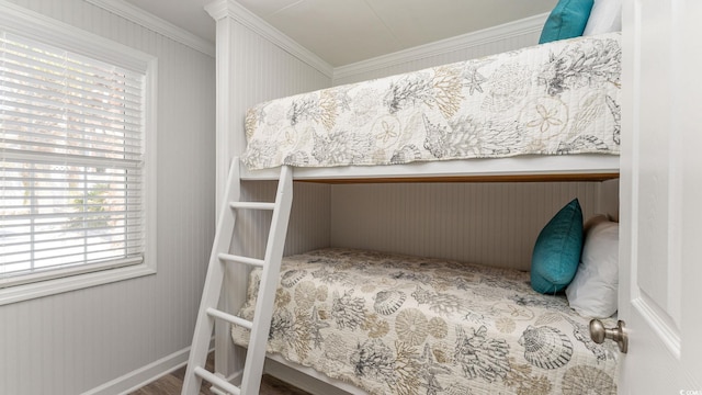 bedroom featuring baseboards and ornamental molding