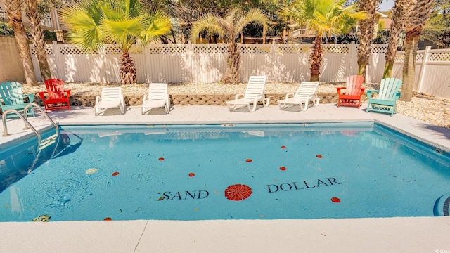 view of pool with a fenced backyard, a fenced in pool, and a patio