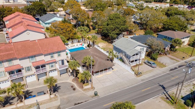 birds eye view of property with a residential view