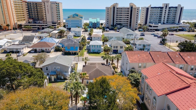 bird's eye view featuring a view of city and a water view