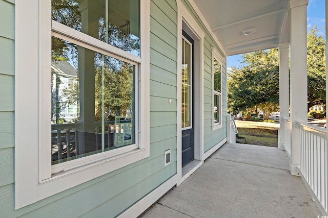 view of patio featuring a porch