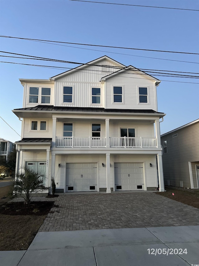 view of front of property with a garage