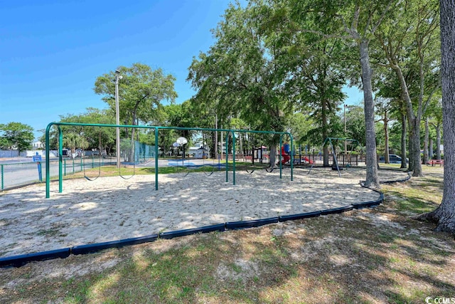 community play area featuring fence