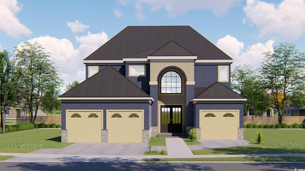 view of front of property with a garage and a front lawn