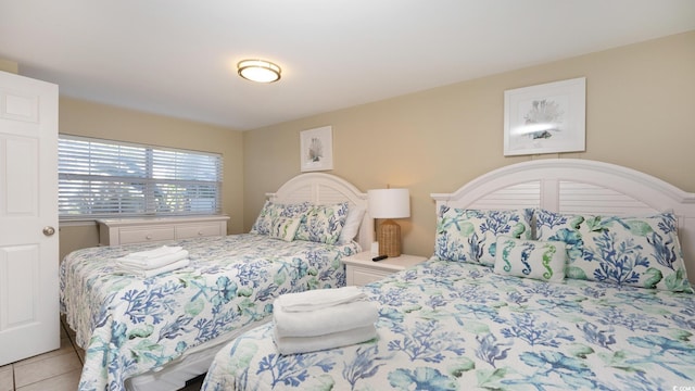 bedroom with tile patterned flooring