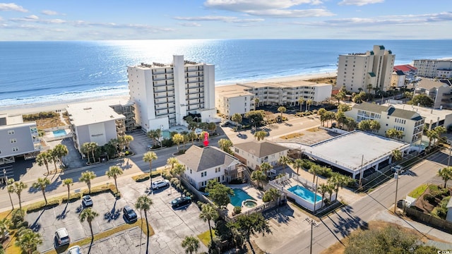 aerial view with a beach view and a water view