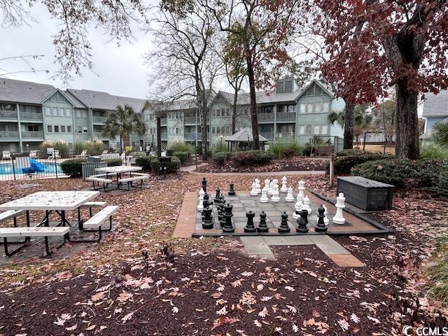 view of property's community featuring a pool