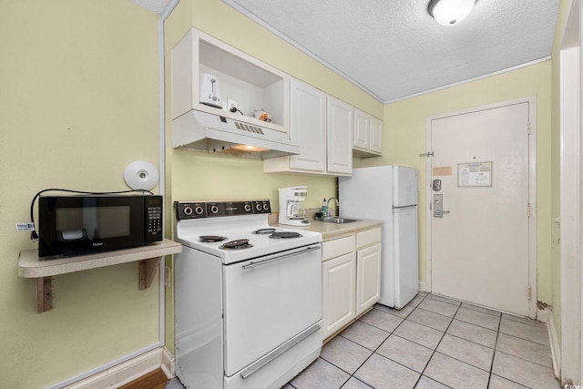 kitchen with white cabinetry, a textured ceiling, and white appliances