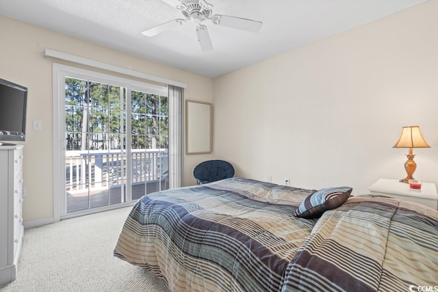 bedroom with access to outside, light colored carpet, ceiling fan, and baseboards